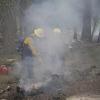 Smoke billowing in the faces of firefighters